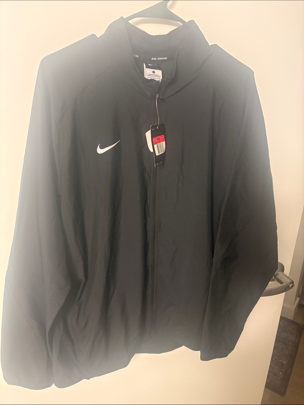 Nike Black Men's Windbreaker Jacket with White Swoosh